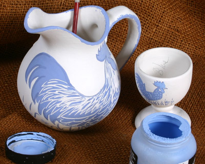 blue and white cockerel design jug and egg cup work in progress