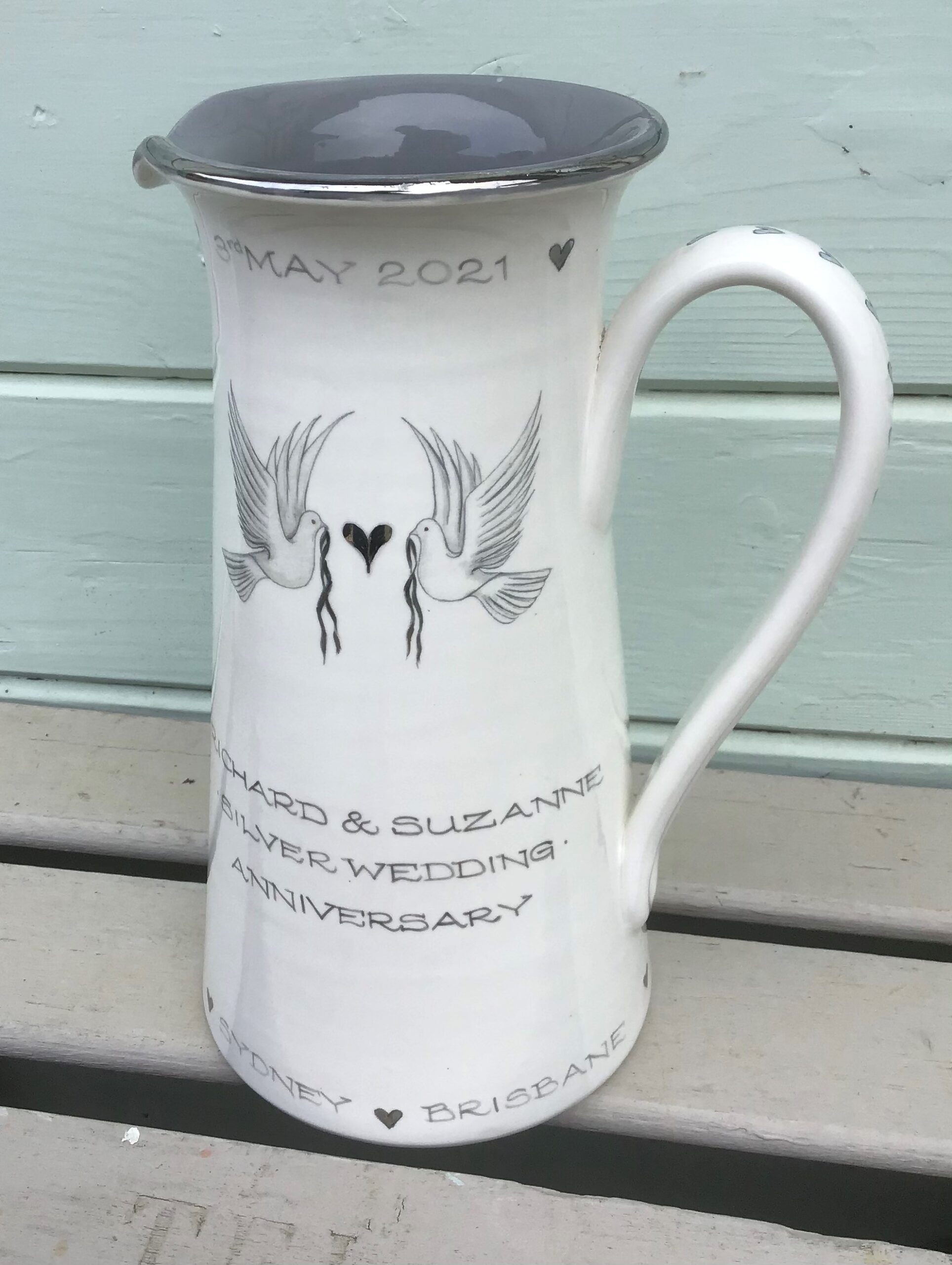 Anniversary jug decorated with real platinum